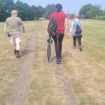 team members walking across the ralley in Leicester